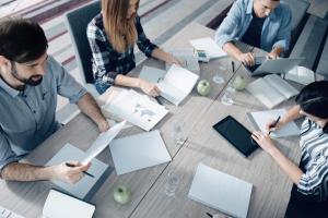 Top view of young group of people working in the office